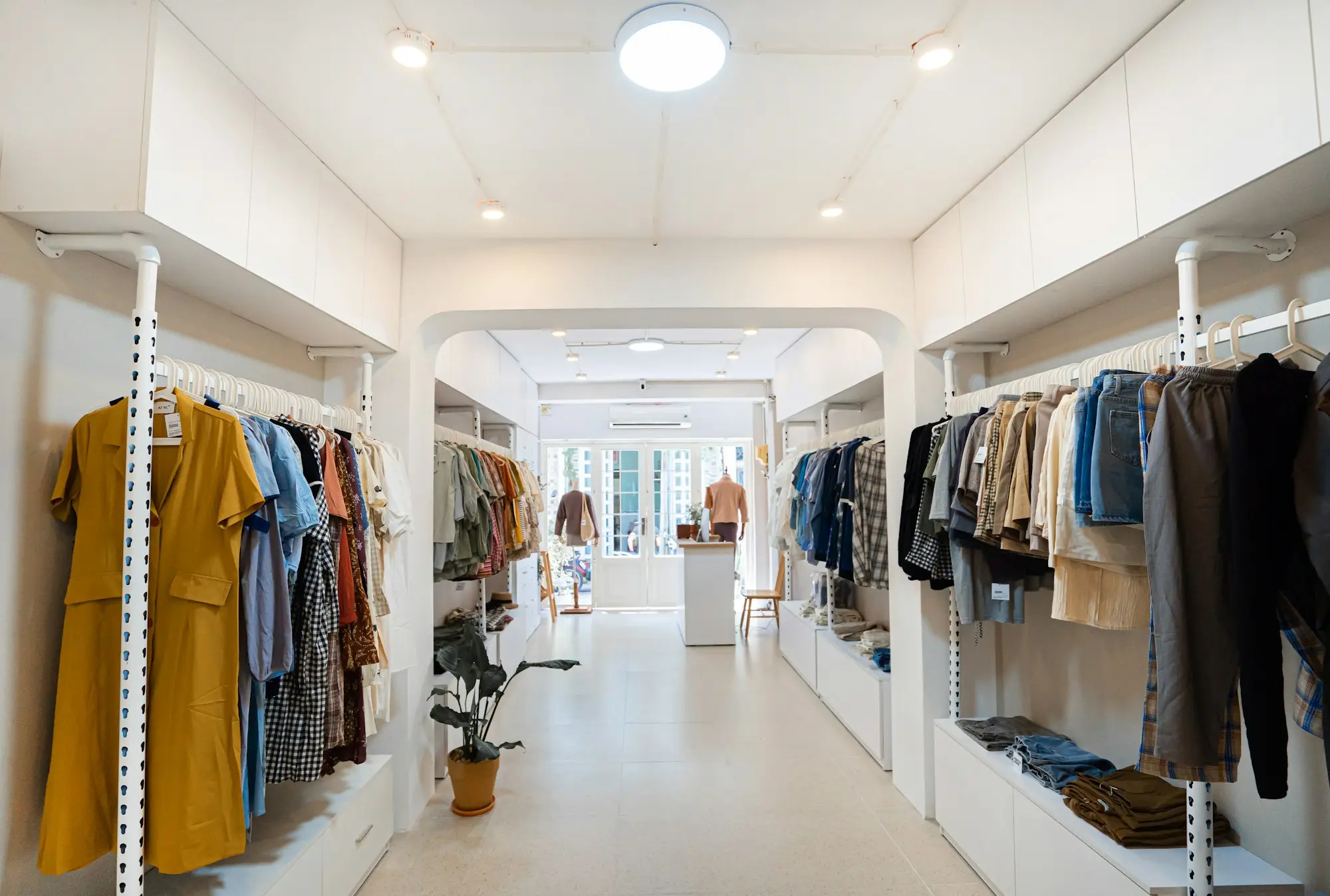 Clothes hanging on a rack in a store