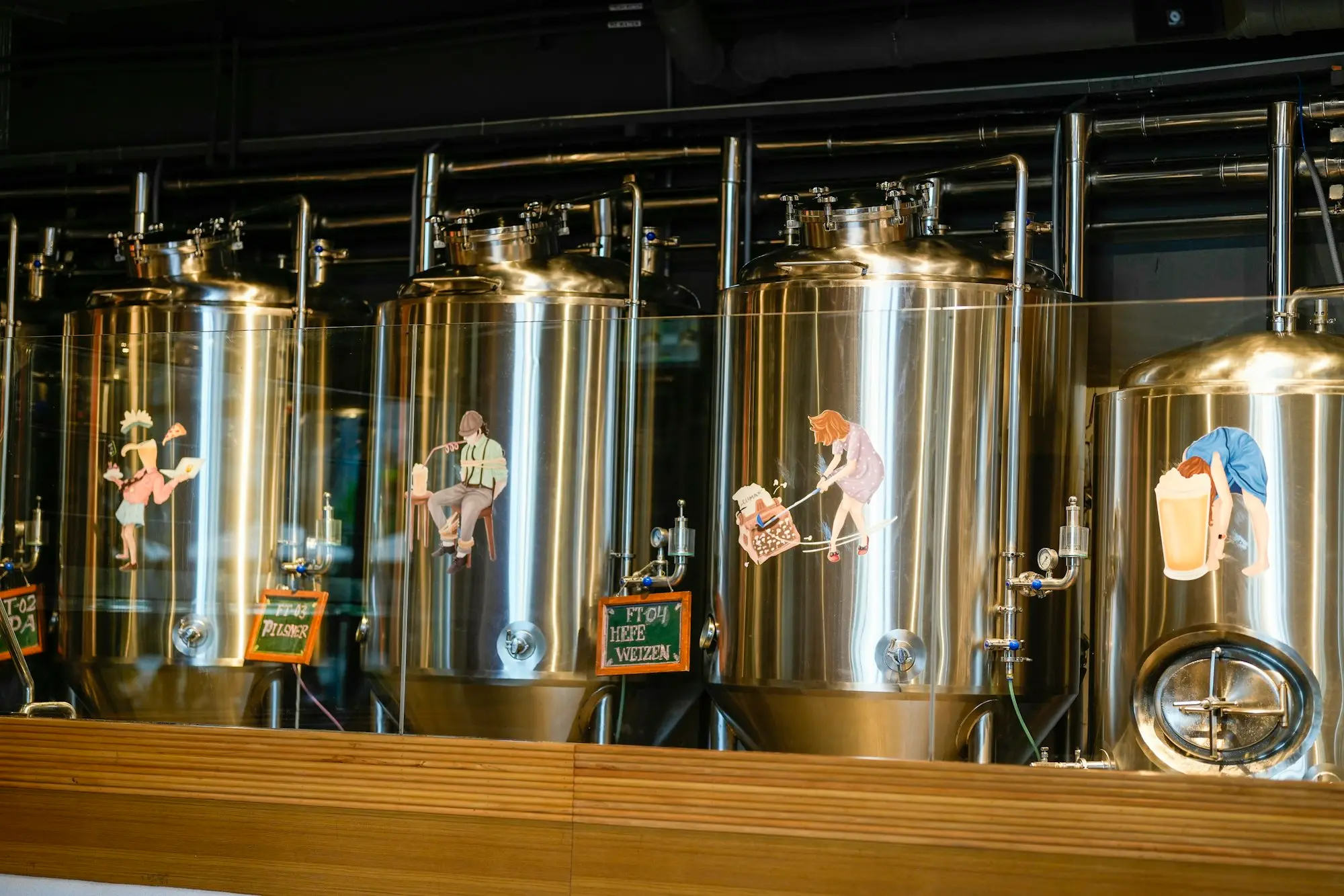 Stainless steel fermentation tanks in a craft brewery