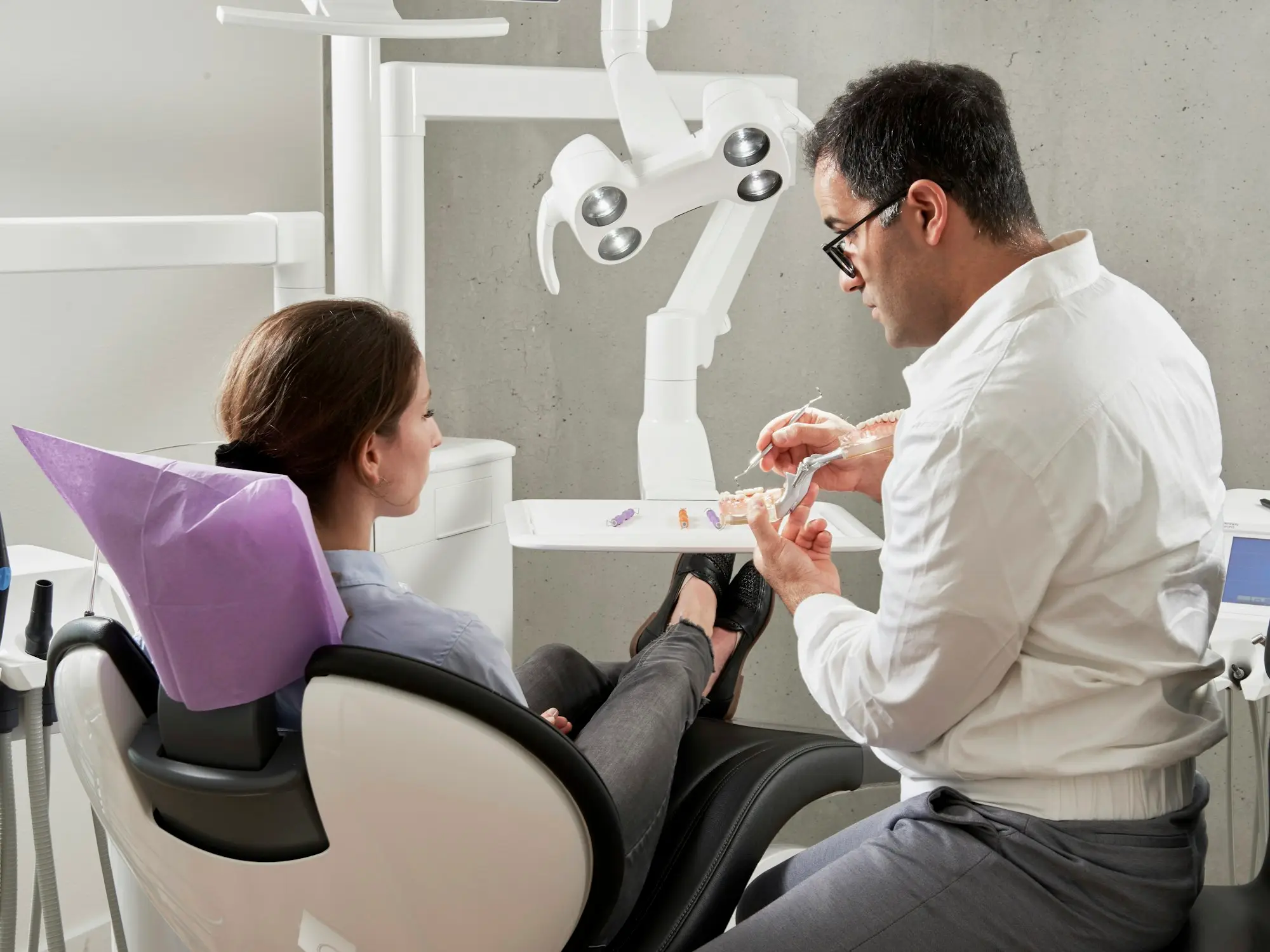 Practice owner sitting in an office chair