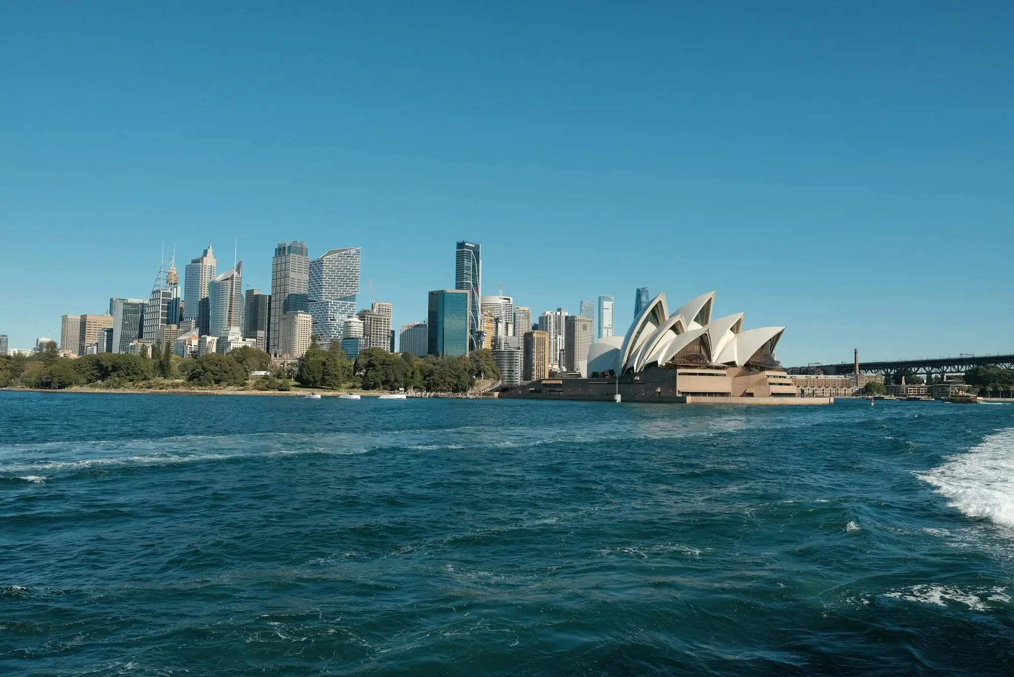 Sydney city skyline seen from a boat on the harbour