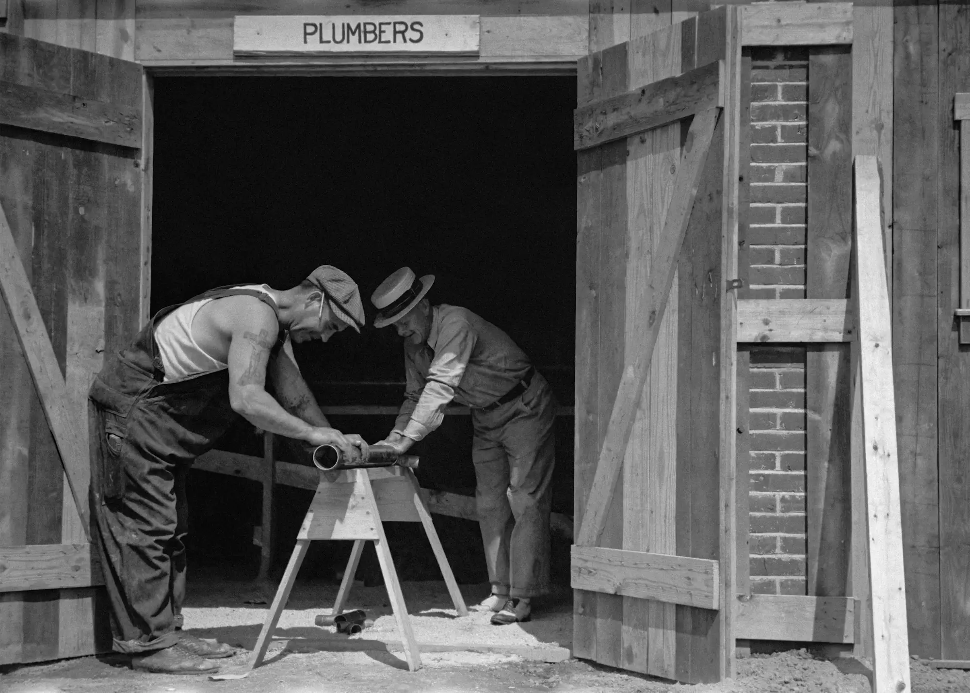 Two tradies working on a timber structure
